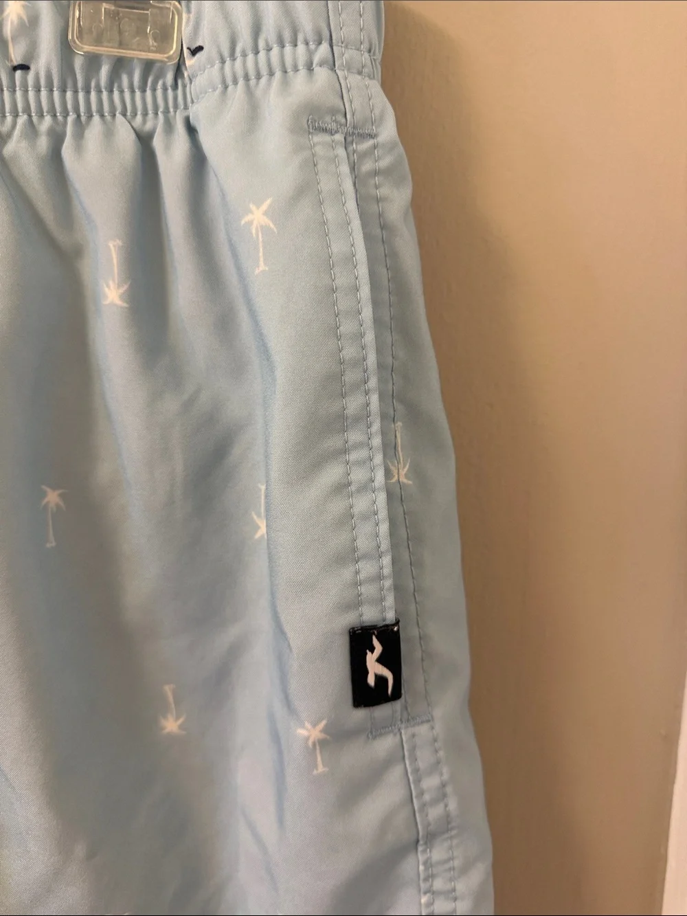 Hollister light blue palm tree pattern mid thigh swim trunks L